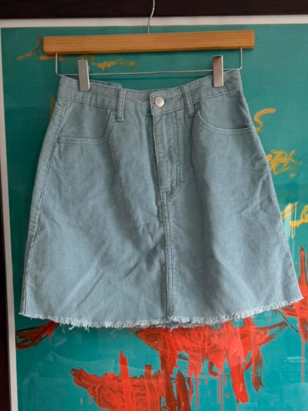 Twinn baby blue corduroy mini skirt with frayed edges